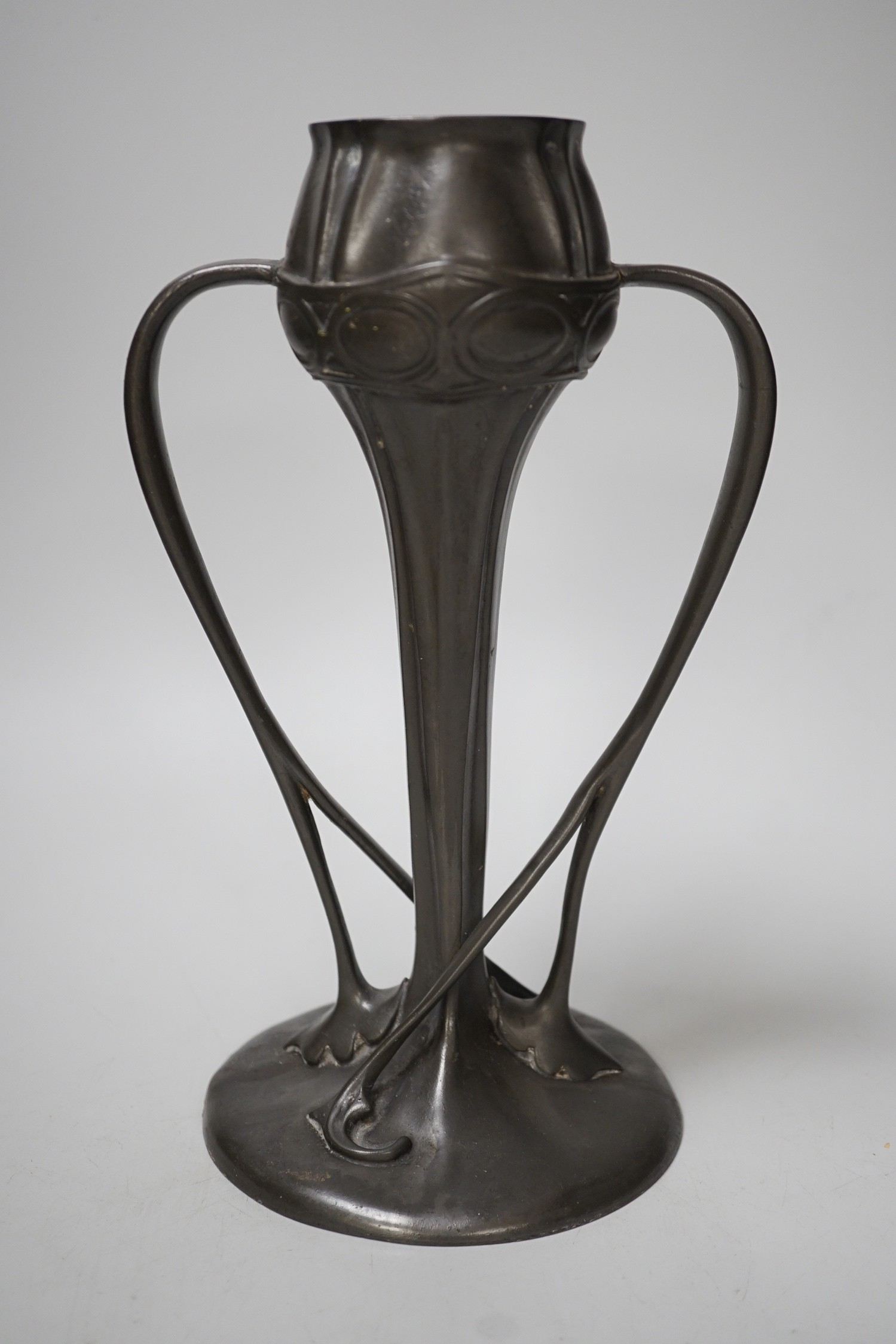 A Tudric pewter vase, model no. 029, 25cm tall